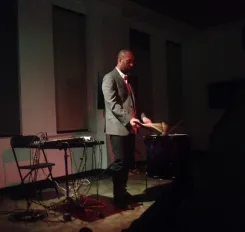 Jake Meginsky uses mallets to roll on a bar of iron